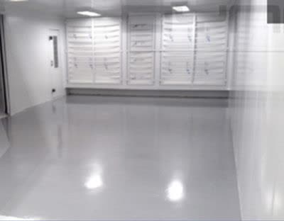 Pressurized paint booth
